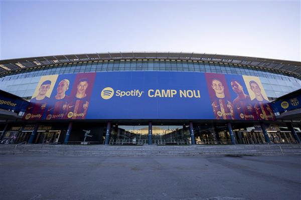 Levan leads the way! Barcelona's huge Camp Nou poster gets a new look as the star of the facade makes his debut in the spotlight