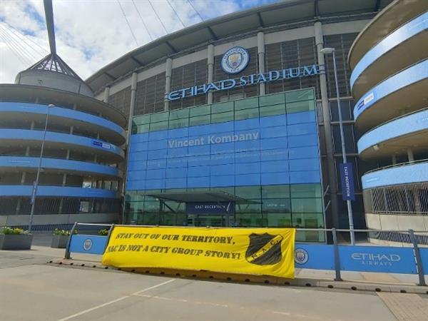 Manchester City expansion boycotted! NAC fans rock city with banner protest 